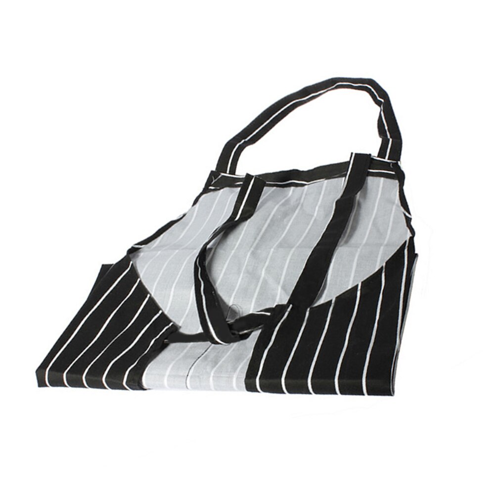 Striped halter apron laid flat showing the neck strap and pockets