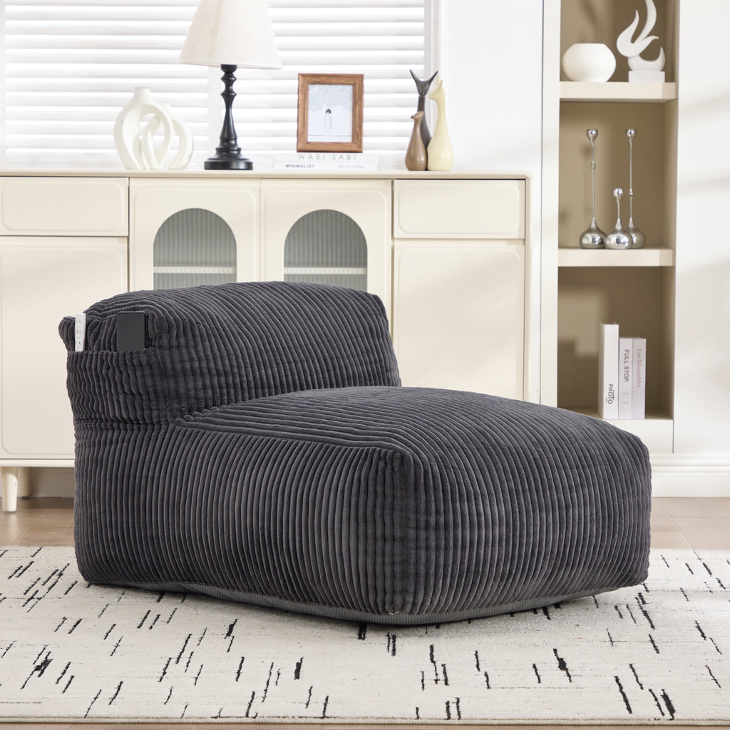 Corduroy bean bag chair placed in a light, minimally furnished room