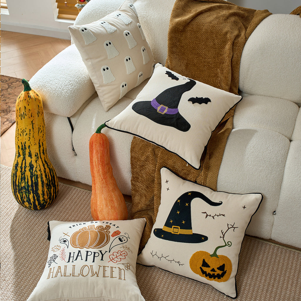 Happy Halloween pumpkin cushion cover styled with real pumpkins and gourds