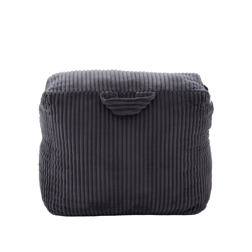Dark gray corduroy bean bag chair viewed from a front three-quarter angle