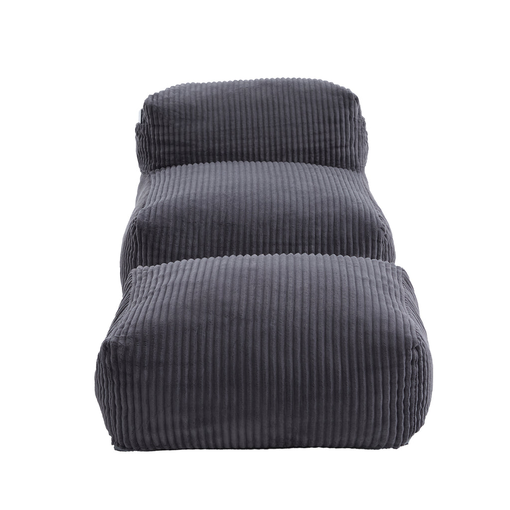 Dark gray corduroy bean bag chair seen from the side and rear