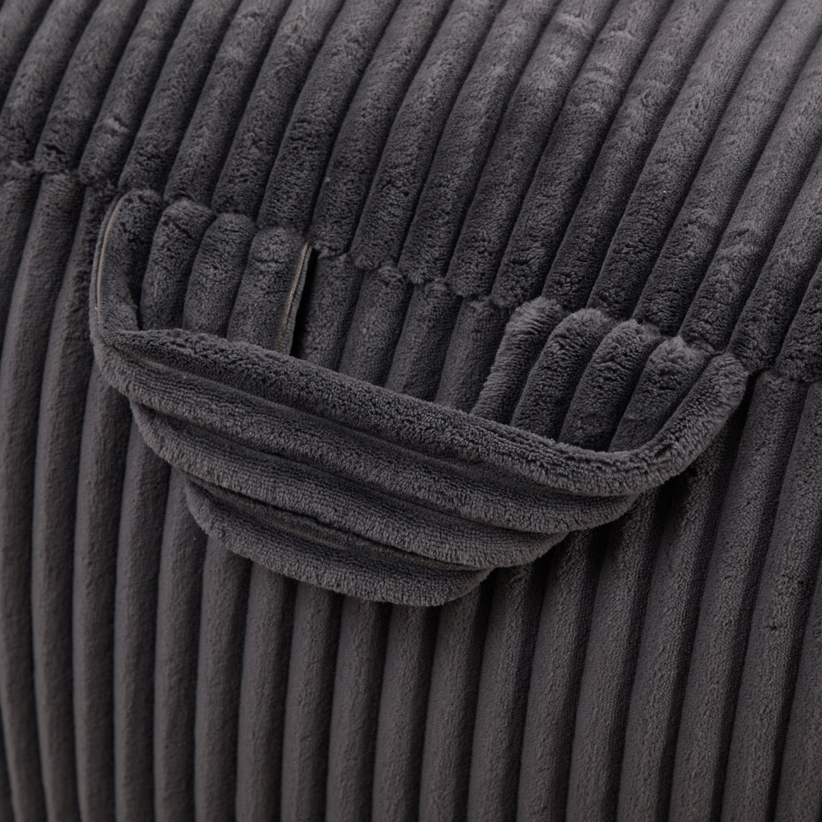 Close-up of the built-in side pocket on the corduroy bean bag chair
