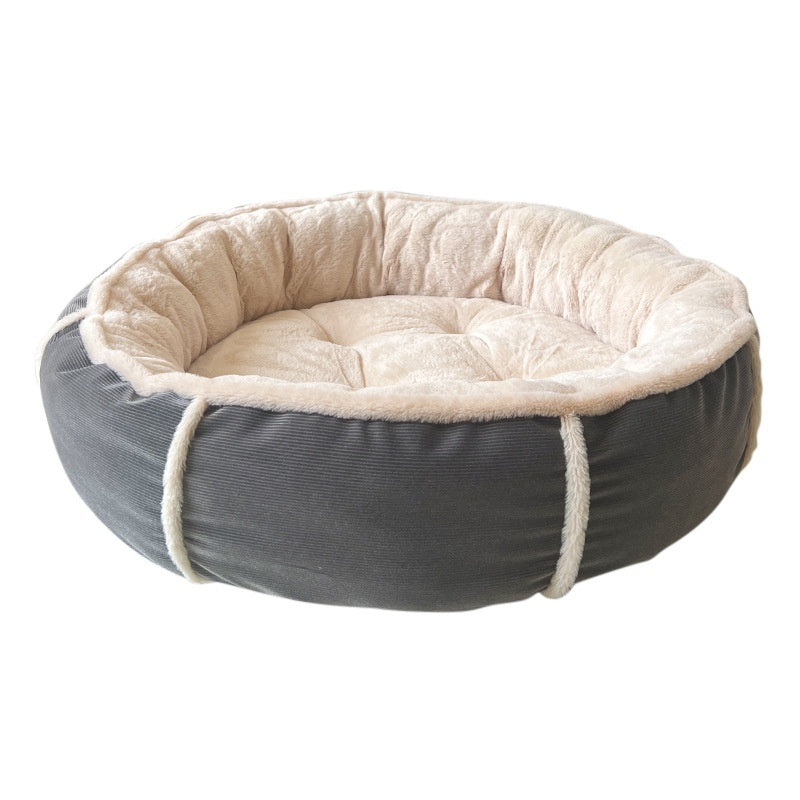 Puppy resting against the soft raised edge of the pet bed