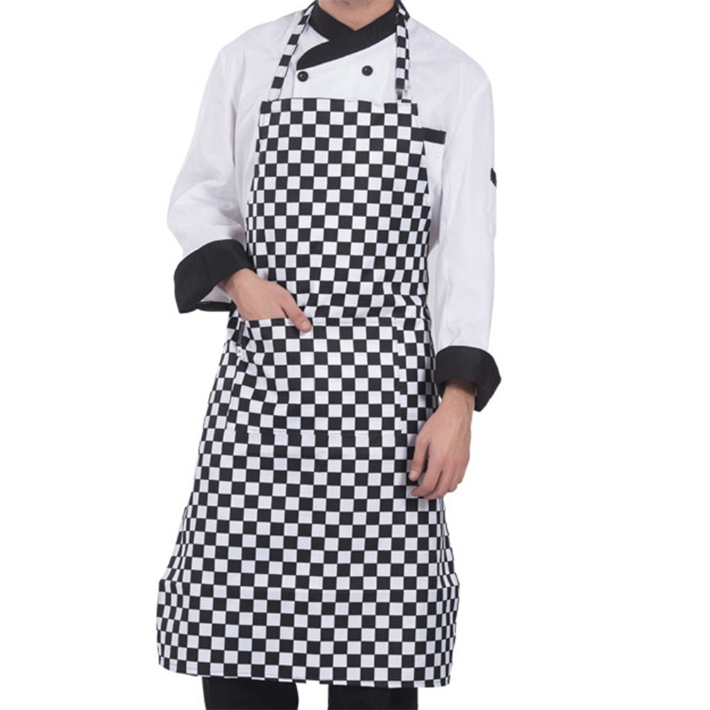 Black and white checkerboard halter neck apron worn over a shirt