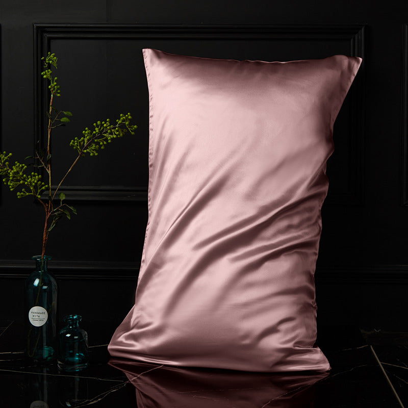 Soft pink mulberry silk envelope pillowcase with a delicate lustrous surface